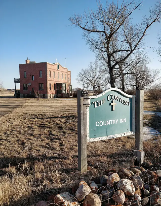 The Convent Country Inn sign and old convent building